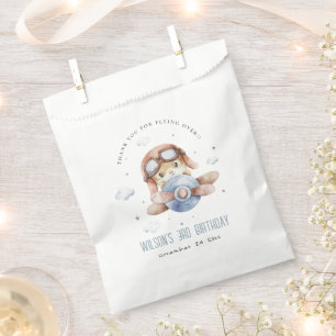 Niedliche blaue Fliege über Teddy Animal Flugzeug  Geschenktütchen
