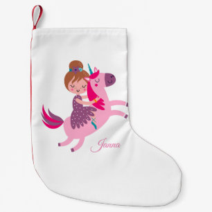Niedliche Blondie-Hair-Girl-Reiten auf einem Einho Kleiner Weihnachtsstrumpf