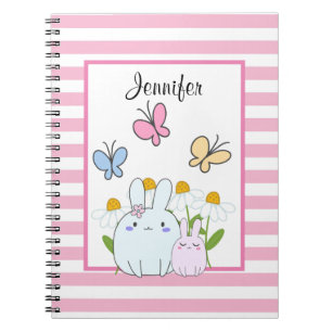 Niedliche Bunnies mit Frühlingsmessen und Schmette Notizblock