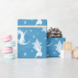 Niedliche Bunnies und Sterne auf blau Geschenkpapier