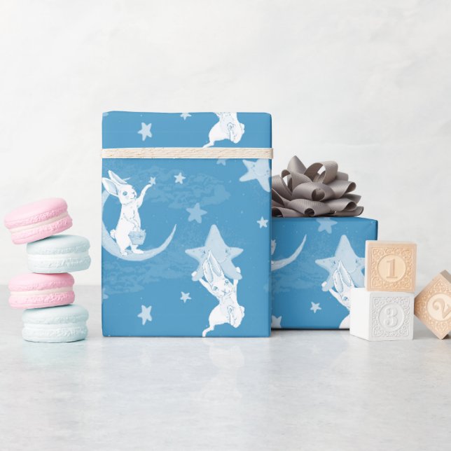 Niedliche Bunnies und Sterne auf blau Geschenkpapier (Babyparty)