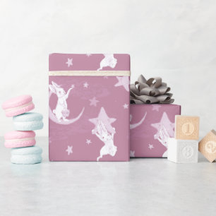 Niedliche Bunnies und Sterne auf rosa Geschenkpapier