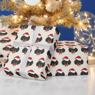 Niedliche Dackel mit Weihnachtsmannmütze Muster W Geschenkpapier