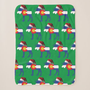 Niedliche Elche mit einem Weihnachtshut Sherpadecke
