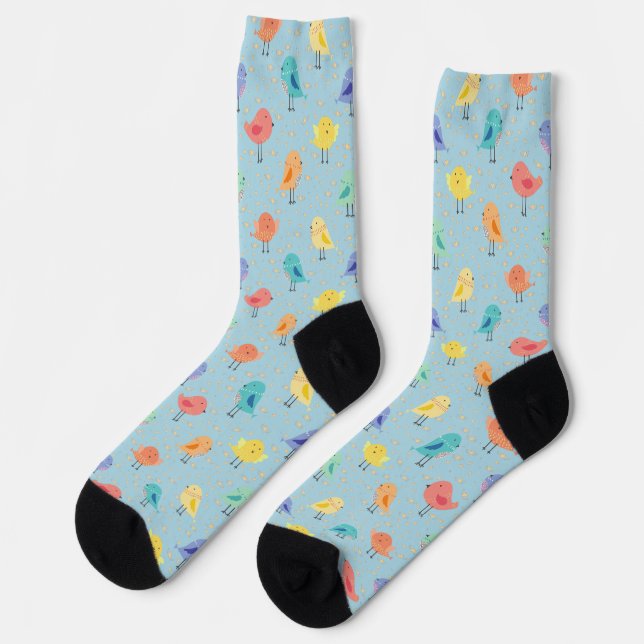 Niedliche farbige Vögel Cartoon zeichnend, auf bla Socken (Linkes Detail)