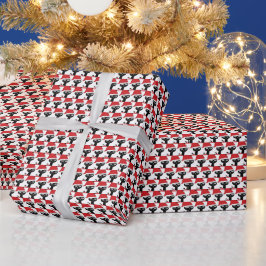 Niedliche festliche Katze mit roter Weihnachtsmann Geschenkpapier