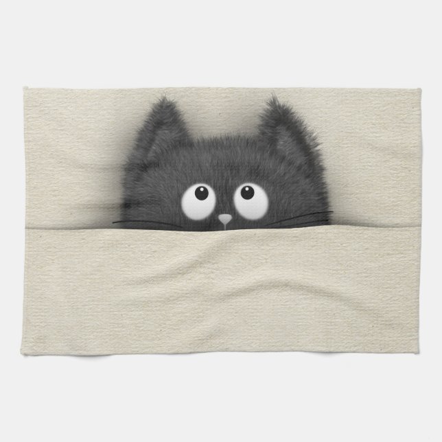 Niedliche flaumige schwarze Katze, die heraus Geschirrtuch (Horizontal)