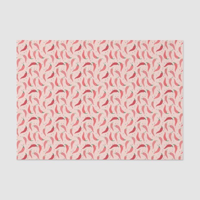 Niedliche Gemusterte Chile-Paprikaschoten auf rosa Seidenpapier (Vorderseite)