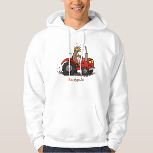 Niedliche glückliche Kuh, die einen roten Traktor- Hoodie