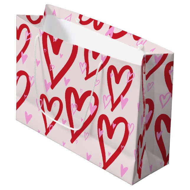 Niedliche Herzen in Rot und Rosa Große Geschenktüte (Vorderseite Schrägansicht)