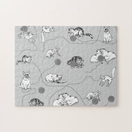 Niedliche Katzen spielen und ein schwaches Muster