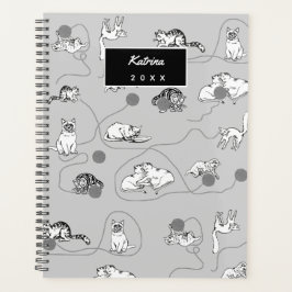 Niedliche Katzen spielen und ein schwaches Muster Planer