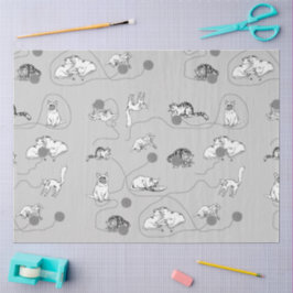 Niedliche Katzen spielen und ein schwaches Muster Seidenpapier