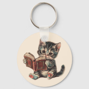 Niedliche Katzenlesebuchabilderung Schlüsselanhänger
