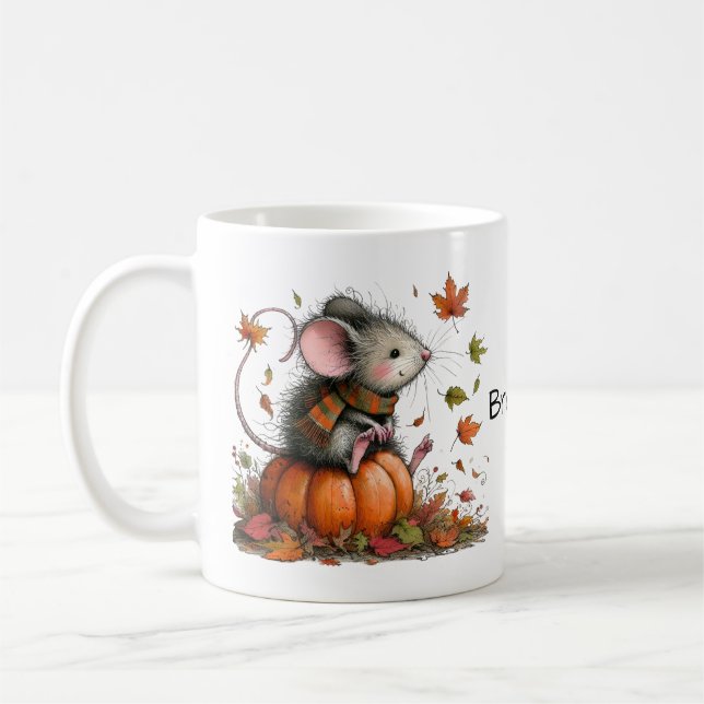 Niedliche Maus auf einer Kürbiskuhlästhesie Kaffeetasse (Links)