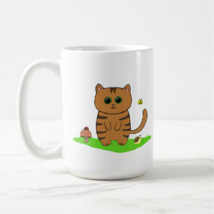 Niedliche Orangenkatze auf grüner Wiese Kaffeetasse