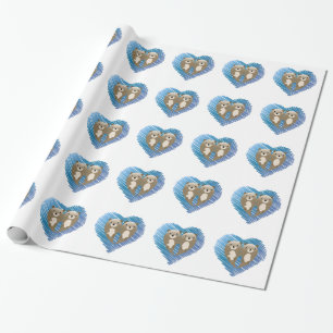 Niedliche Otters mit blauem Herzen im Hintergrund Geschenkpapier