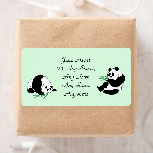 Niedliche Pandas mit Bamboo-Shoots-Labels (Insitu)