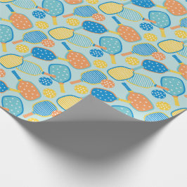 Niedliche Pickleball-Paddle auf hellblau Geschenkpapier
