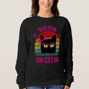 Niedliche Retro kleine Schwester Katze mit rosa Le Sweatshirt