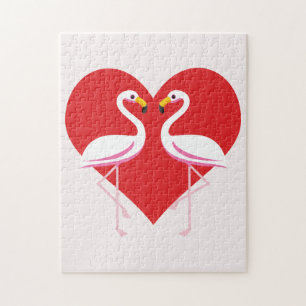 Niedliche Rosa Flamingos mit rotem Herzen
