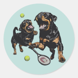 Niedliche Rottweiler Hunde Tennis spielen Runder Aufkleber