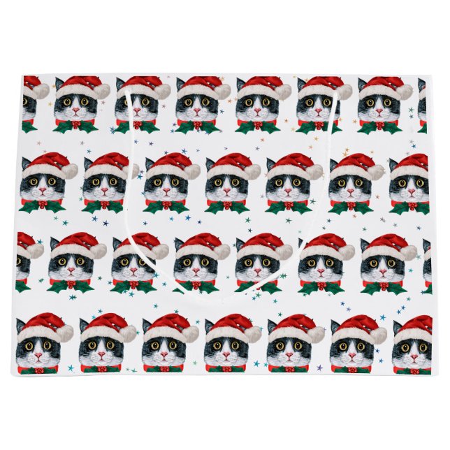 Niedliche Schwarz-Weiß-Katze mit Weihnachtsmannmüt Große Geschenktüte (Vorderseite)