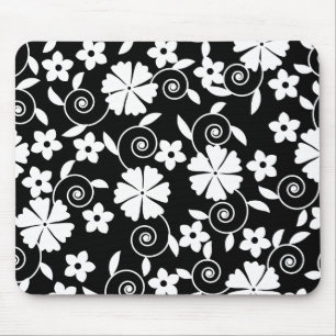 Niedliche Schwarz-weiße Blume im Hintergrund Mousepad