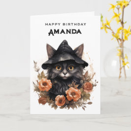 Niedliche schwarze Katze in einem Hexenhut zum Geb Karte