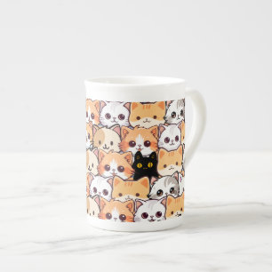 Niedliche schwarze Katze in orangefarbenen Katzen Prozellantasse