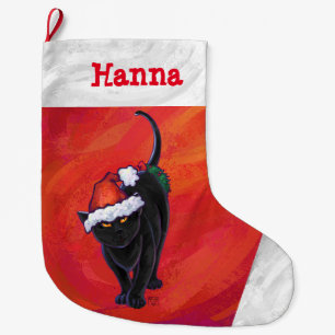 Niedliche Schwarze Katze in Weihnachtsmannmütze au Großer Weihnachtsstrumpf