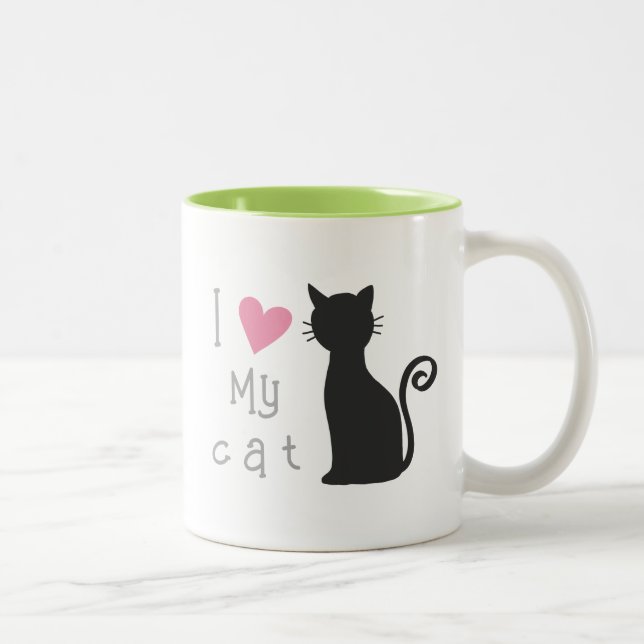 Niedliche schwarze Katze mit hübschem rosa Herz Zweifarbige Tasse (Rechts)
