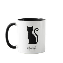 Niedliche schwarze Katze mit schwarzem und weißem