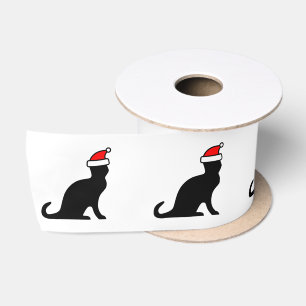 Niedliche schwarze Weihnachtskatze mit rotem Satinband