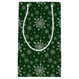 Niedliche Silbergraue Weihnachtsschneeflocken auf  Kleine Geschenktüte
