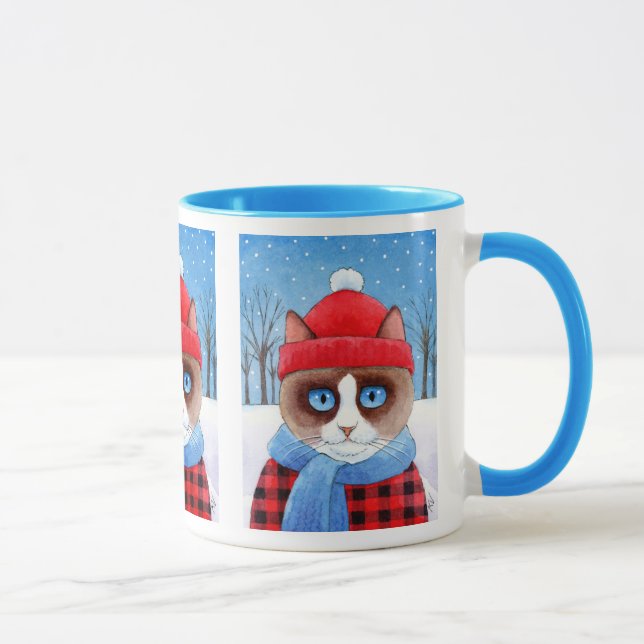 Niedliche Snowshoekatze, schneebedeckte Tasse (Rechts)
