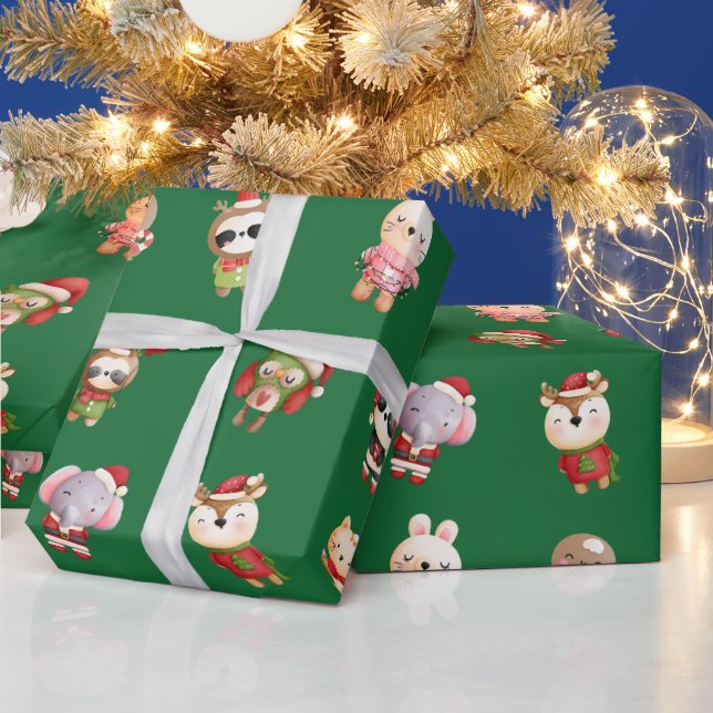 Niedliche und erfreuliche Weihnachtsbabys grün Geschenkpapier (Feiertage)