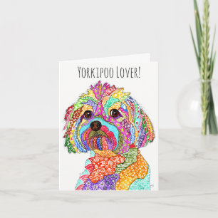 Niedliche und farbenfrohe Yorkipoo Grußkarte Karte