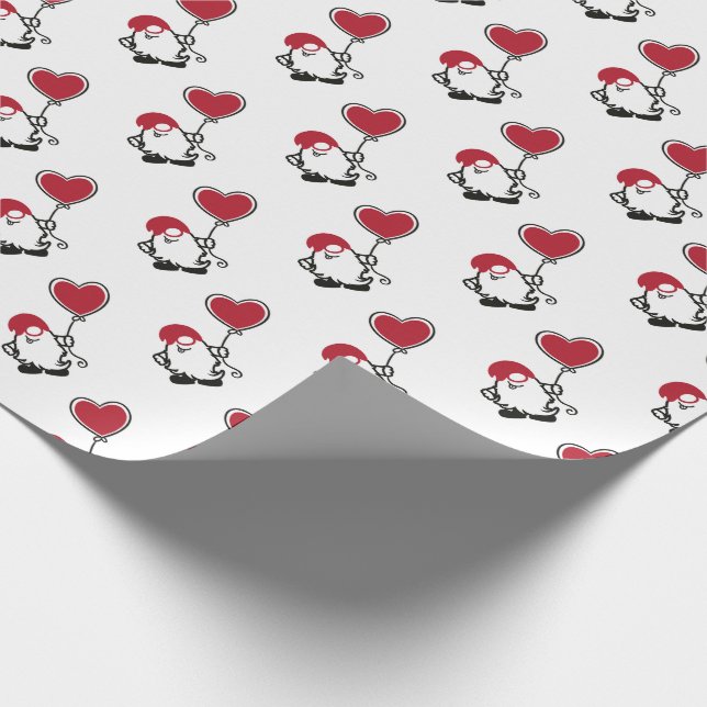 Niedliche Valentines Gnome mit einem herzförmigen  Geschenkpapier (Ecke)