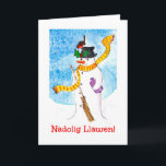 Niedliche walisische Weihnachtskarte, Snowman und  Feiertagskarte<br><div class="desc">Eine lustige Weihnachtskarte mit Frohen Weihnachten in Walisisch und ein Rotkehlchen,  der auf dem Hut des Schneemanns gelandet ist und die heiligen Beeren genießt. Aus einer skurrilen,  handbemalten Illustration von Judy Adamson.</div>