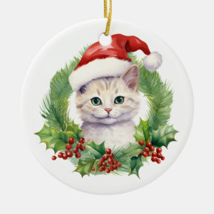 Niedliche Weihnachtskatze in einer Weihnachtsmannm Keramik Ornament