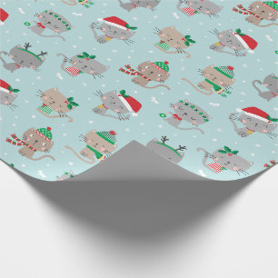 Niedliche Weihnachtskatzen auf hellblau Geschenkpapier