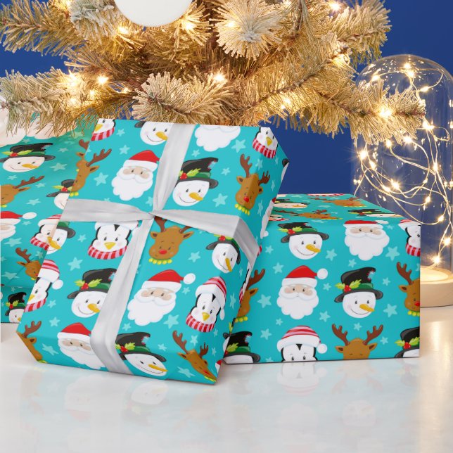 Niedliche Weihnachtszeichen Muster auf blau Geschenkpapier (Feiertage)