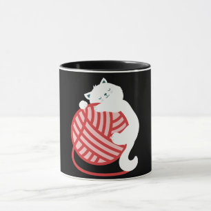 Niedliche weiße Katze mit Garnkugel Tasse
