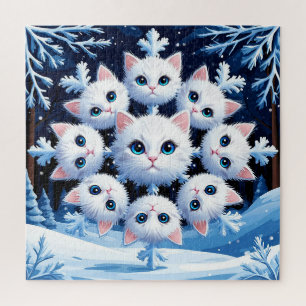 Niedliche weiße Katzengesichter in einem Schneeflo