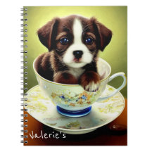 Niedliche Welpe in einem Teacup