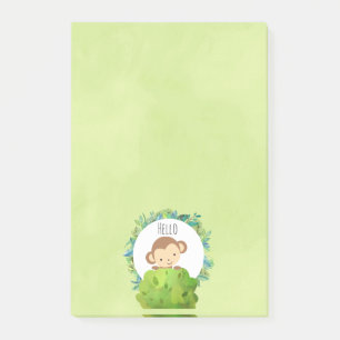 Niedlicher Affe, der von hinter Bush herbeiwindet Post-it Klebezettel