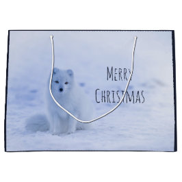 Niedlicher arktischer Fox im Hintergrund des schne Große Geschenktüte