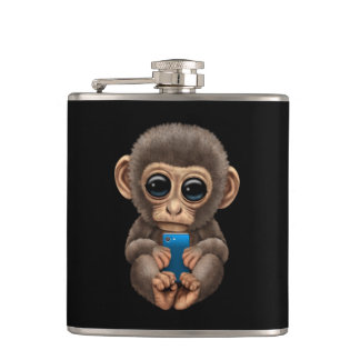 Niedlicher Baby-Affe, der ein Flachmann