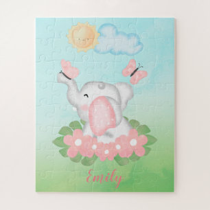 Niedlicher Baby Elephant mit rosa Blume